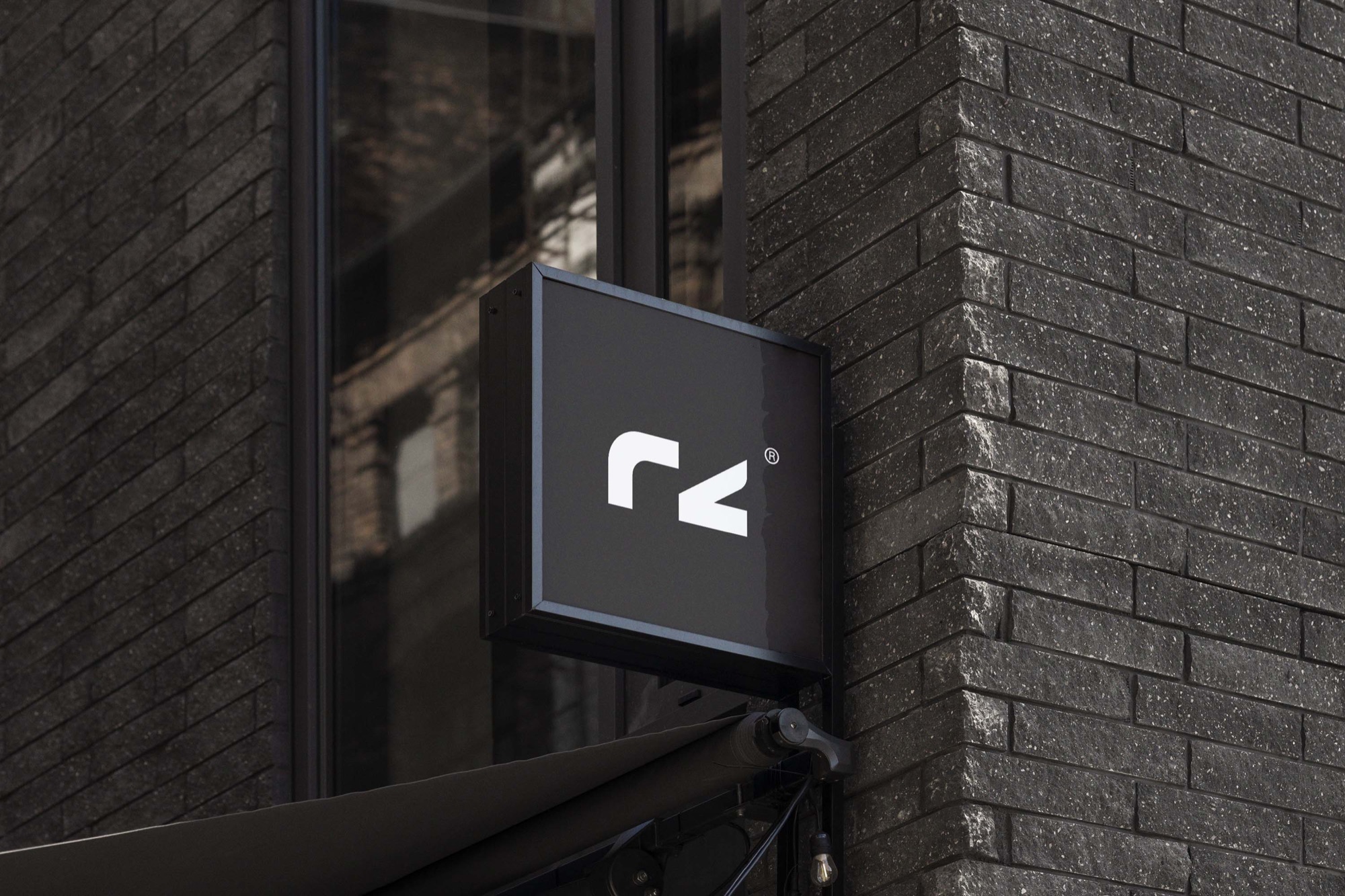 Romeo Zúlu Investment Capital — the rz mark on a projecting shopfront sign