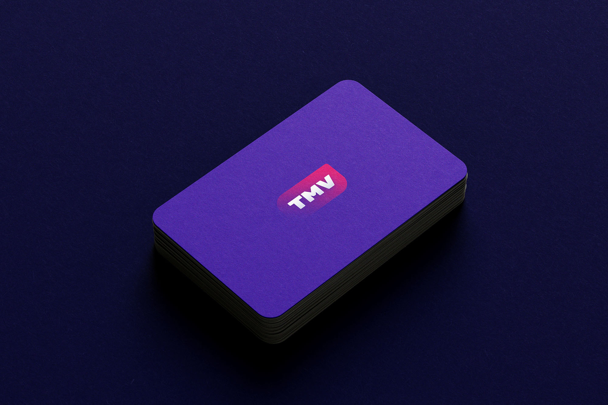 The Muslim Vibe — a stack of purple business cards carrying the TMV mark